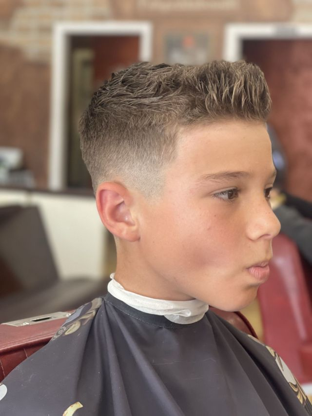 Kids' fade with textured spiky top at JM Barber Co. in Lake Park, FL
